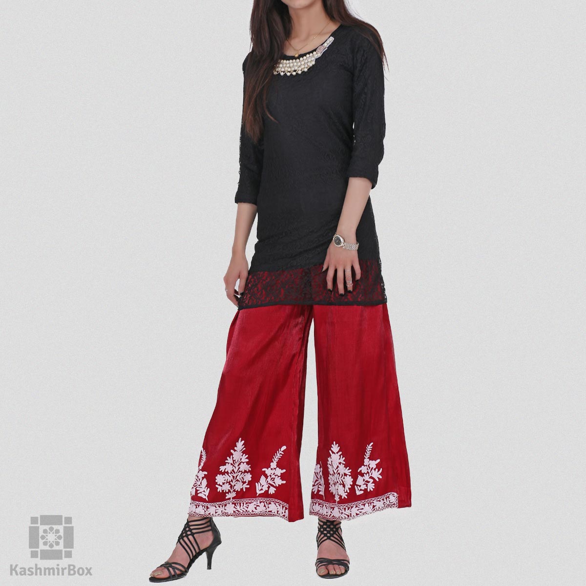 Cotton silk handkerchief hemline top detailed with attached tassels along  with flared dhoti pants